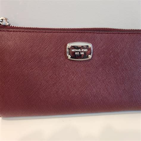 michael kors burgundy wallet|More.